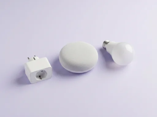 A smart plug, a small smart speaker and a smart light bulb